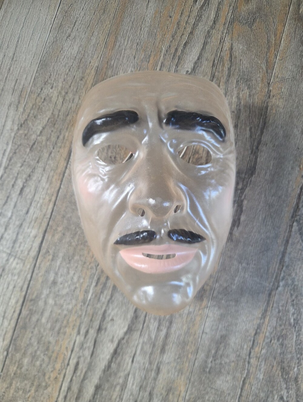 Ceramic Face Sculpture Wall Accent in Brown with Black Features